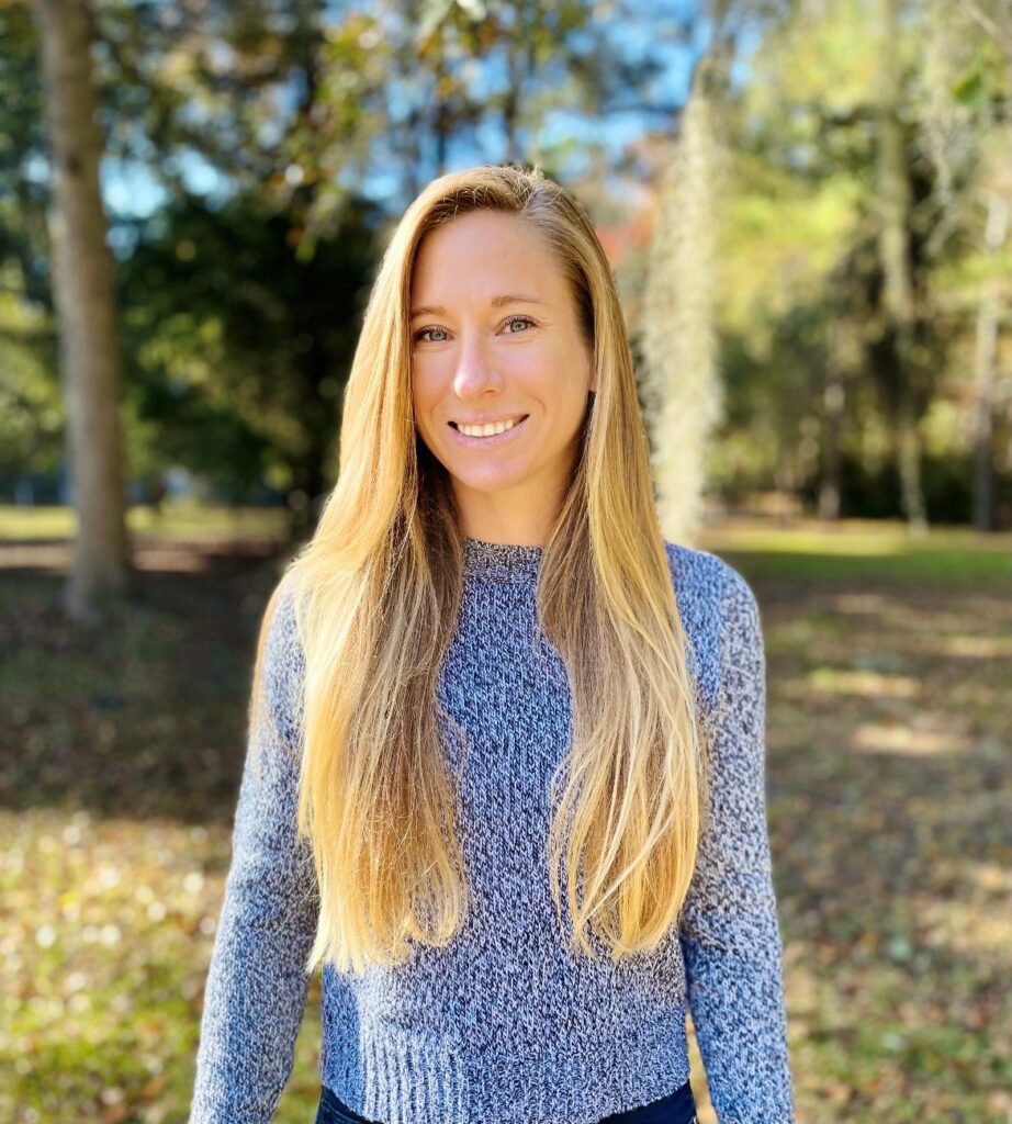 A woman with long blonde hair